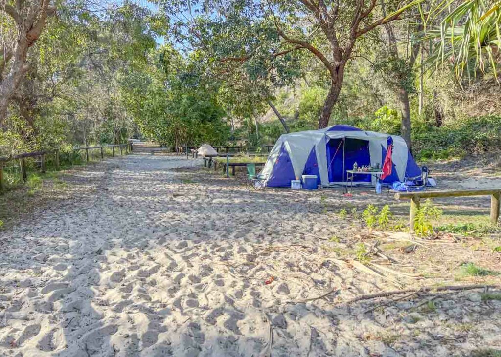 A tent on a sand campsite in Moreton Island, QLD
